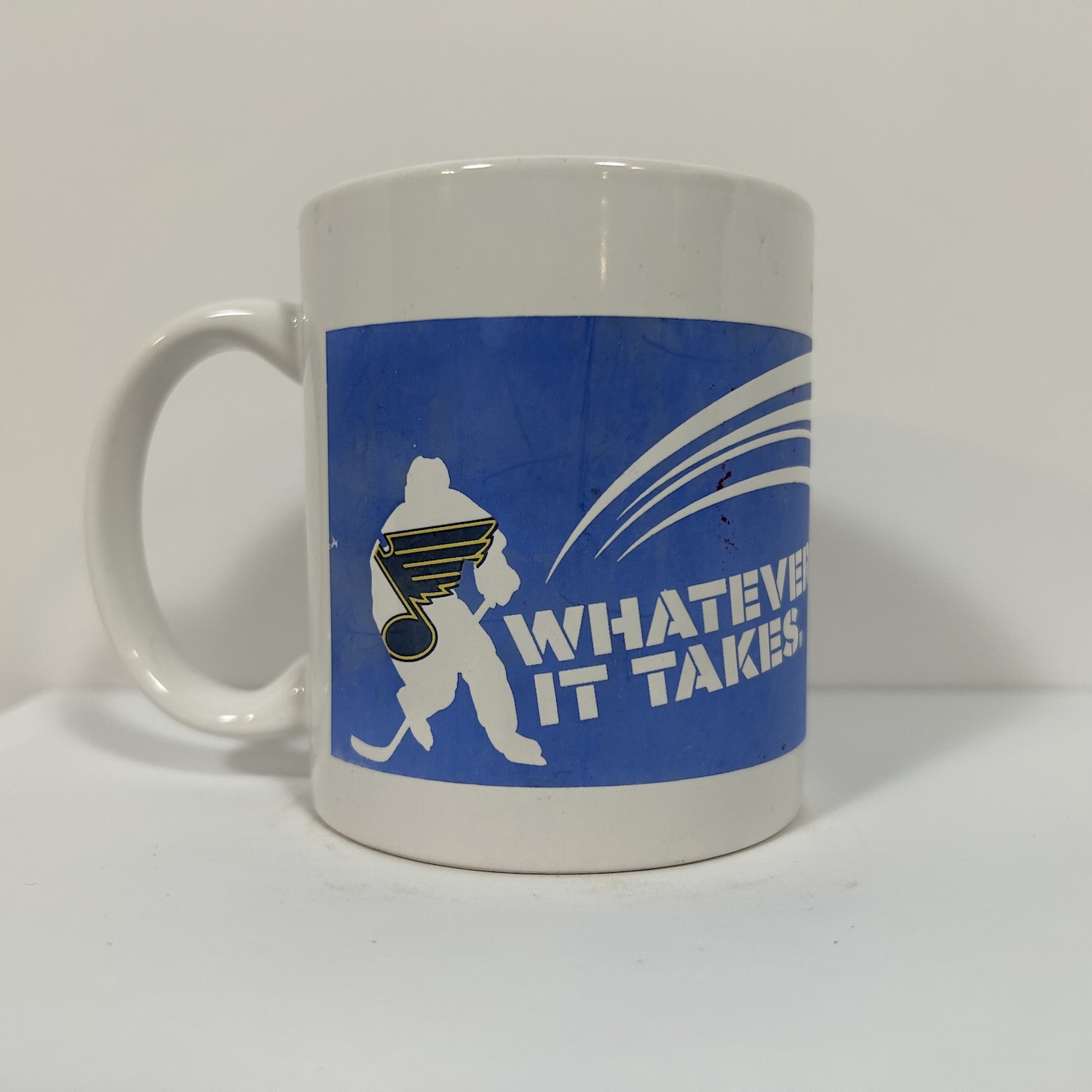 front of 2010 coffee mug