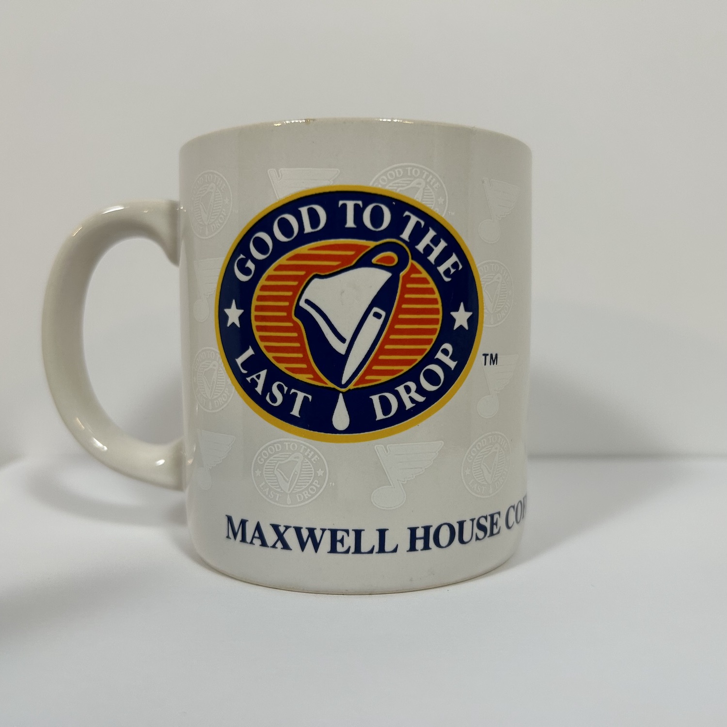 front of 1990 coffee mug